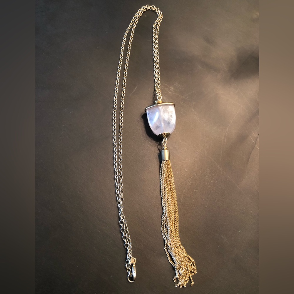 Long gold costume jewelry necklace. Opaque stone & tassel